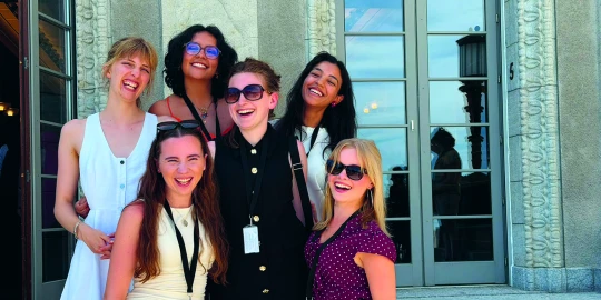 Lily (left) with her summer school colleagues.