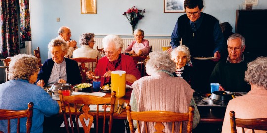 Early residents enjoy a meal at Westdale
